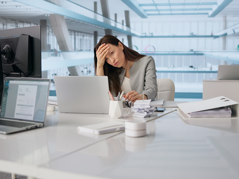 Overwhelmed Office Worker Struggling With Faulty Software